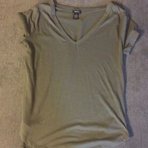 A cute olive green v-neck shirt.